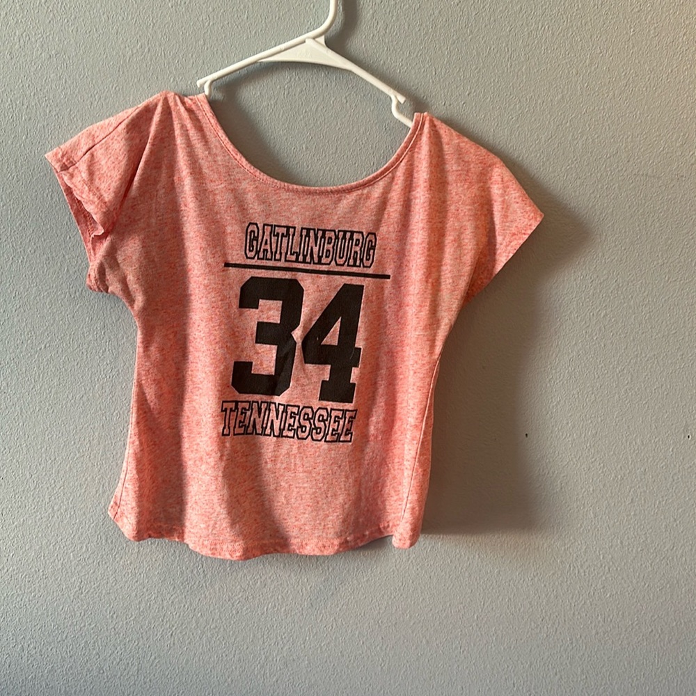 A pink crop Tennessee shirt
